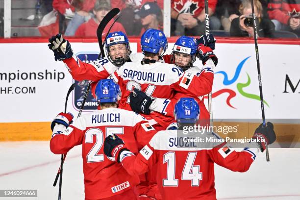 Jiri Kulich of Team Czech Republic joins teammates Stanislav Svozil, Matyas Sapovaliv, Eduard Sale and David Spacek to celebrate his goal during the...