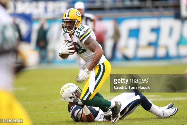 Jermichael Finley of the Green Bay Packers runs with the ball against the San Diego Chargers on November 6, 2011 at Qualcomm Stadium in San Diego,...