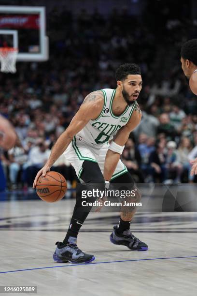 Jayson Tatum of the Boston Celtics dribbles the ball during the game against the Dallas Mavericks on January 5, 2022 at the American Airlines Center...