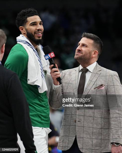 Jayson Tatum of the Boston Celtics smiles as he is interviewed by Jared Greenberg of NBA on TNT after the game against the Dallas Mavericks on...