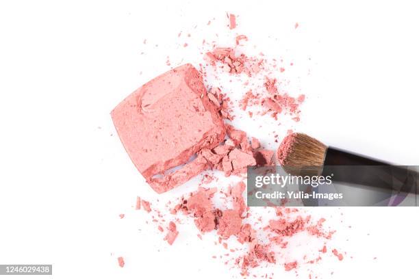 high angle view of cosmetic powder with brush - rouge stock-fotos und bilder