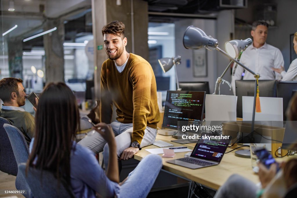 Group Of Happy Computer Programmers Talking In The Office High-Res ...