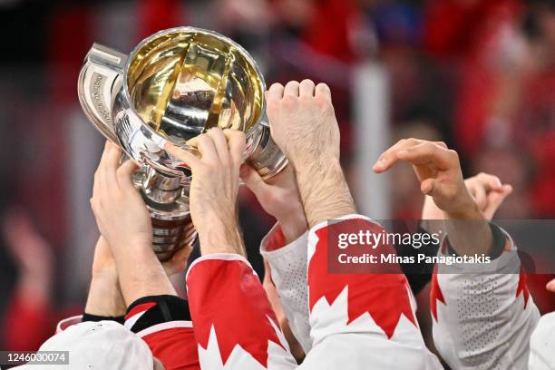 Team Canada hold up the IIHF World Championship Cup as they celebrate gold after defeating Team Czech Republic 3-2 in overtime at the 2023 IIHF World...