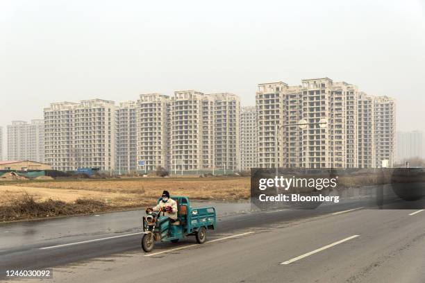 Residential buildings in Zhengzhou, Henan province, China, on Thursday, Jan. 6, 2023. China is planning to relax restrictions on developer borrowing,...