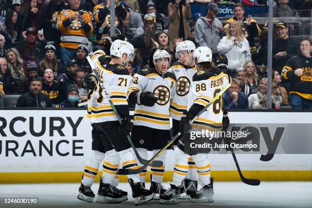 Brad Marchand of the Boston Bruins celebrate his goal with teammates during the second period against the Los Angeles Kings at Crypto.com Arena on...