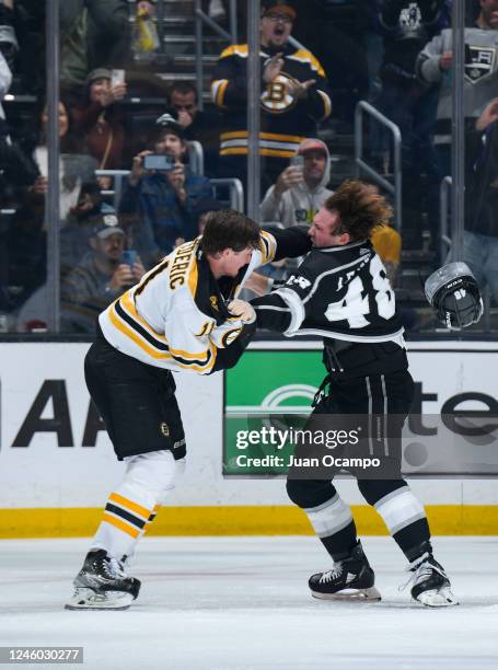 Trent Frederic of the Boston Bruins and Brendan Lemieux of the Los Angeles Kings fight during the second period at Crypto.com Arena on January 5,...