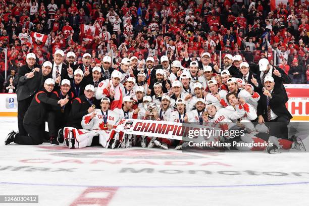 Team Canada pose with their gold medals and the IIHF World Championship Cup after defeating Team Czech Republic 3-2 in overtime at the 2023 IIHF...