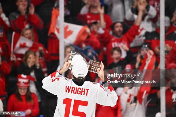 Shane Wright of Team Canada skates with the IIHF World Championship Cup after Team Canada defeated Team Czech Republic 3-2 in overtime at the 2023...