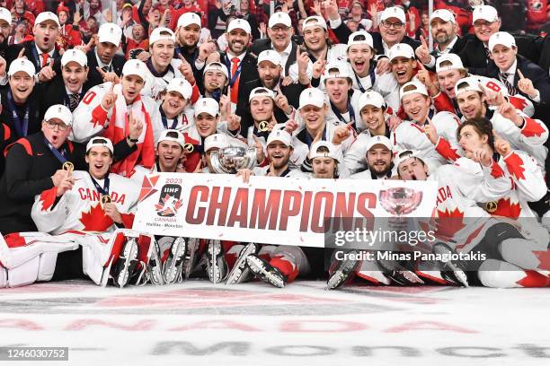 Team Canada pose with their gold medals and the IIHF World Championship Cup after defeating Team Czech Republic 3-2 in overtime at the 2023 IIHF...