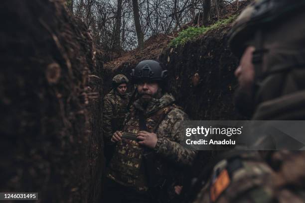 Ukrainian soldiers in a trench on the Vuhledar frontline in Donetsk oblast, 5 January 2023.