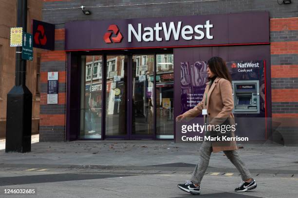 Member of the public walks past a branch of NatWest bank on 28 October 2022 in Slough, United Kingdom. High street banks including HSBC, NatWest and...