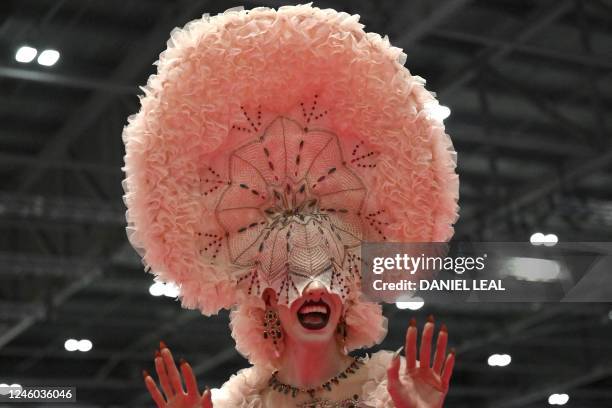 Drag queen performs on a catwalk during RuPaul's DragCon UK 2023 Drag Queen convention at the ExCeL centre in east London on January 6, 2023.