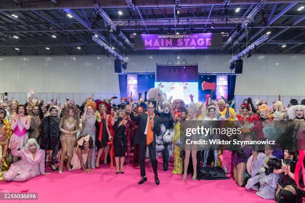 RuPaul is joined by drag queens during the ribbon cutting ceremony during the opening of the RuPauls DragCon UK 2023, presented by World of Wonder at...