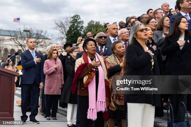 House Democratic Leader Hakeem Jeffries, D-N.Y., Rep. Nancy Pelosi, D-Calif., and other members recite the Pledge of Allegiance during a ceremony to...