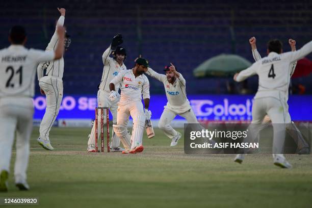 New Zealand's players celebrate after the dismissal of Pakistan's Sarfaraz Ahmed during the fifth and final day of the second cricket Test match...