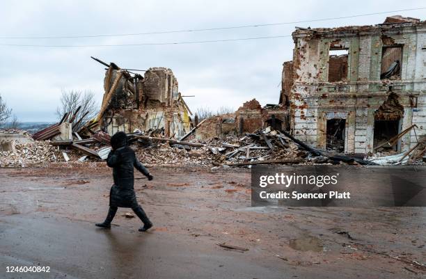 People walk through the town of Kupiansk which has experienced regular shelling from the Russians on January 06, 2023 in Kupiansk, Ukraine. Despite a...