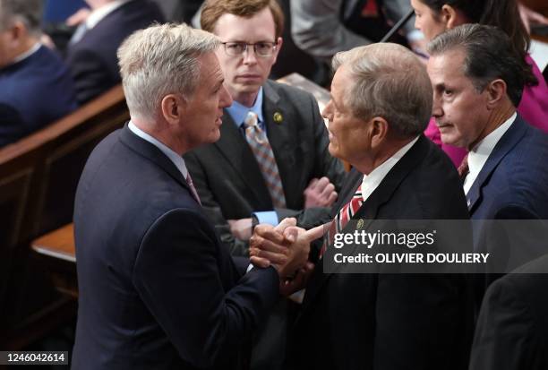 Republican Representative of California Kevin McCarthy speaks with Representative of South Carolina, Ralph Norman, after the 12th vote for House...