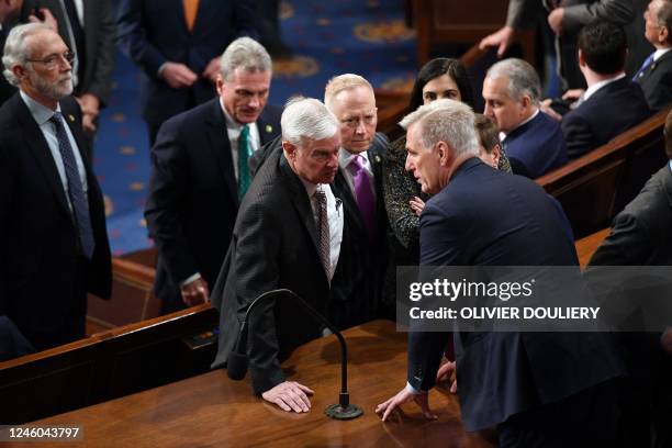 Republican Representative of California Kevin McCarthy speaks with Representative of Florida, Daniel Webster , after the 12th vote for House Speaker...