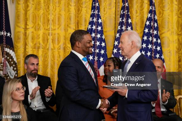 President Joe Biden presents Capitol Police Officer Eugene Goodman a Presidential Citizens Medal during a ceremony to mark the two-year anniversary...