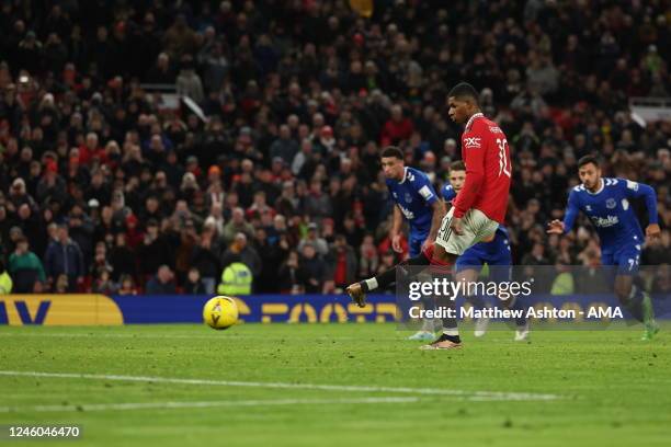 Marcus Rashford of Manchester United scores a goal from the penalty spot to make it 3-1 during the Emirates FA Cup Third Round match between...