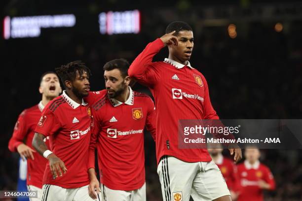 Marcus Rashford of Manchester United celebrates after scoring a goal to make it 3-1 during the Emirates FA Cup Third Round match between Manchester...