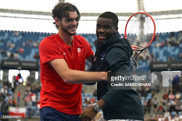 Taylor Fritz of the US celebrates victory with teammate Frances Tiafoe after defeating Polands Hubert Hurkacz in their men's singles semi-final match...