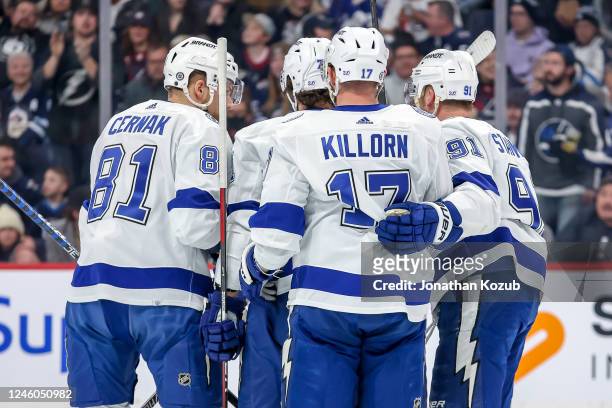 Erik Cernak, Anthony Cirelli, Alex Killorn and Steven Stamkos of the Tampa Bay Lightning celebrate a first period goal against the Winnipeg Jets at...