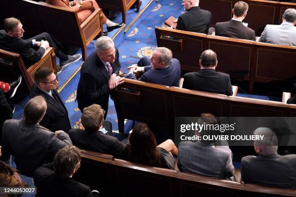 Representative Matt Gaetz and US Representative Kevin McCarthy speak in the House Chamber as voting continues for a new speaker at the US Capitol in...