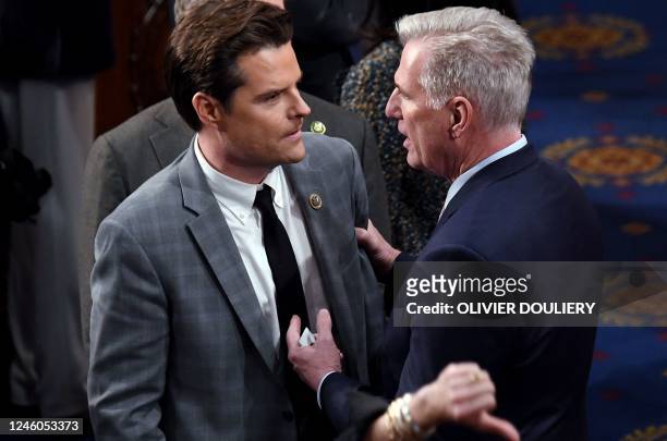 Representative Kevin McCarthy speaks to US Representative Matt Gaetz in the House Chamber at the US Capitol in Washington, DC, on January 6, 2023. -...
