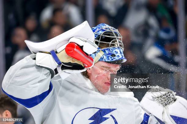 Goaltender Andrei Vasilevskiy of the Tampa Bay Lightning stays hydrated during a second period stoppage in play against the Winnipeg Jets at the...