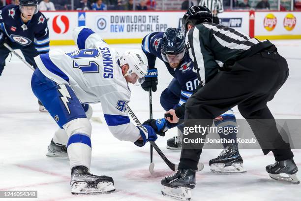 Steven Stamkos of the Tampa Bay Lightning gets set to take a second period face-off against Pierre-Luc Dubois of the Winnipeg Jets at the Canada Life...