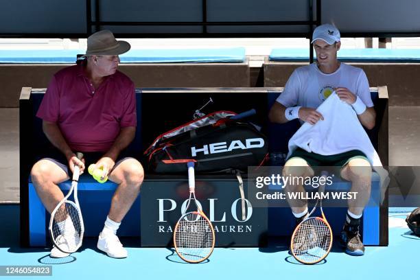 Britain's Andy Murray speaks with coach Ivan Lendl during a training session ahead of the Australian Open tennis tournament in Melbourne on January...