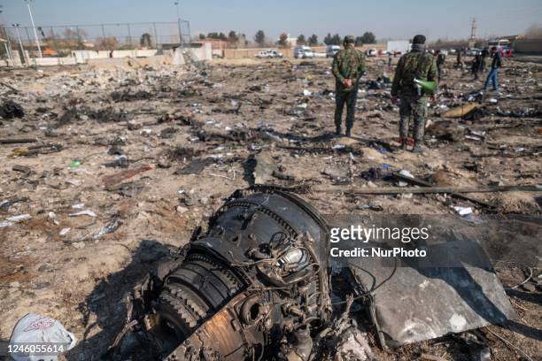 January 8, 2020 file photo shows, A piece of wreckage from the Ukrainian flight PS752 International airlines is seen at the site of a crash about...