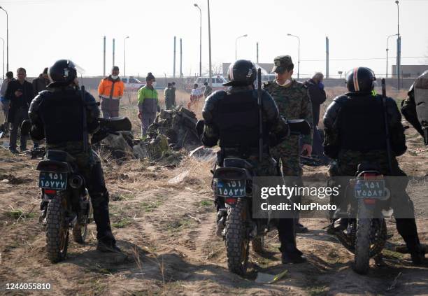 January 8, 2020 file photo shows, Iranian special police forces near wreckages from the Ukrainian flight PS752 International airlines at the site of...