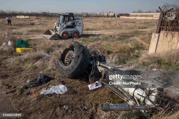 January 8, 2020 file photo shows, A piece of wreckage from the Ukrainian flight PS752 International airlines is seen at the site of a crash about...