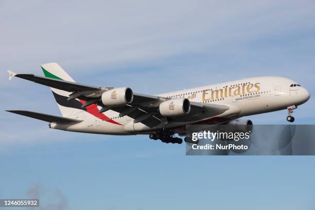 An Emirates Airbus A380 landing at London Heathrow Airport, Hounslow, United Kingdom Wednesday 14th December 2022.