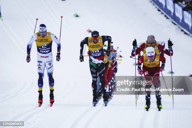 Johannes Hoesflot Klaebo of Team Norway in action, Calle Halfvarsson of Team Sweden in action, Francesco De Fabiani of Team Italy in action during...