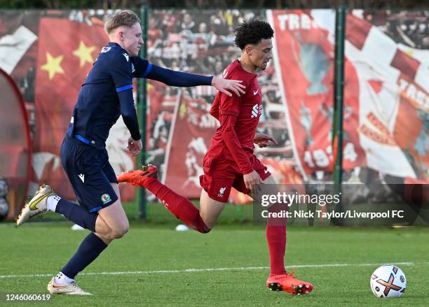 Ranel Young of Liverpool and Tom Atcheson of Blackburn Rovers in action during the U18 Premier League game at the AXA Training Centre on January 7,...