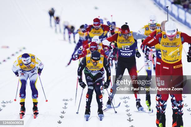 Johannes Hoesflot Klaebo of Team Norway in action, Calle Halfvarsson of Team Sweden in action, Francesco De Fabiani of Team Italy in action during...