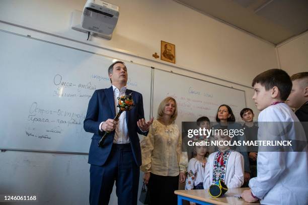 Prime Minister Alexander De Croo, Natalia Anoshyna, Gabriel De Croo, De Croo's wife Annik Penders and Tobias De Croo pictured during a visit of...