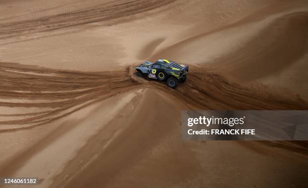 French driver Simon Vitse and his French co-driver Frederic Lefebvre compete during Stage 7 of the Dakar 2023 between Riyadh and Al Duwadimi, Saudi...