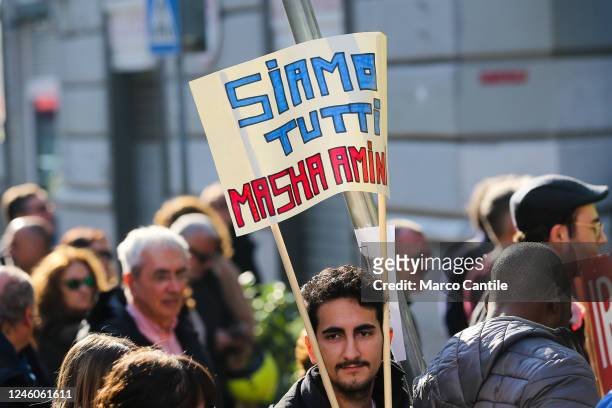 Man with a placard, during the protest and solidarity rally with the Iranian people "Women Life Freedom", against oppression and discrimination in...