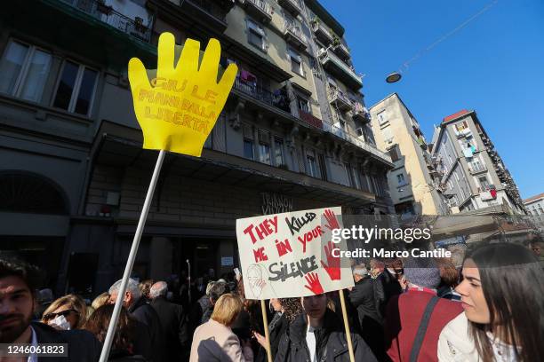 People with placards, during the protest and solidarity rally with the Iranian people "Women Life Freedom", against oppression and discrimination in...