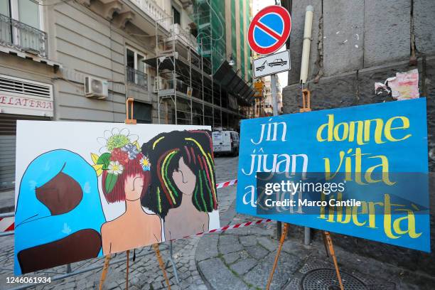 Placards, during the protest and solidarity rally with the Iranian people "Women Life Freedom", against oppression and discrimination in Iran.