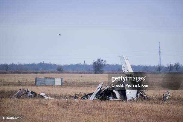 The remains of a downed Ukrainian fighter jet in a field on January 7, 2023 in Kherson, Ukraine. President of the Russian Federation Vladimir Putin...