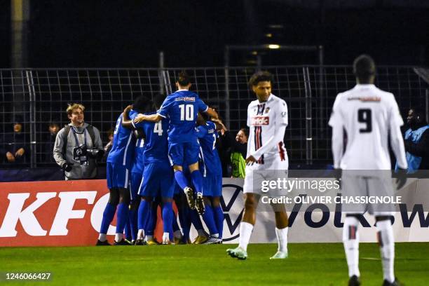 Le Puy's players celebrate a goal during the French Cup round of 64 football match between Le Puy Foot 43 and OGC Nice at the Charles-Massot Stadium...