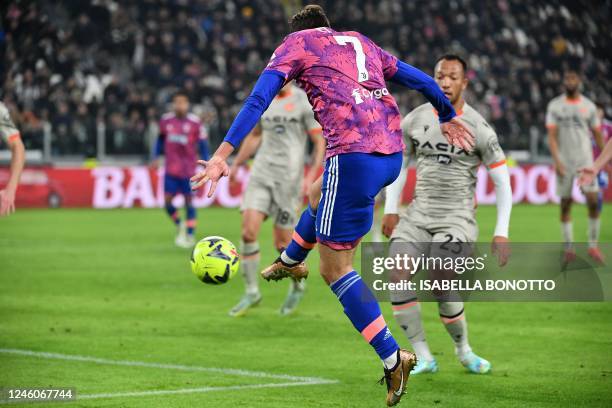 Juventus' Italian forward Federico Chiesa makes a decisive pass for Juventus to open the scoring during the Italian Serie A footbal match between...