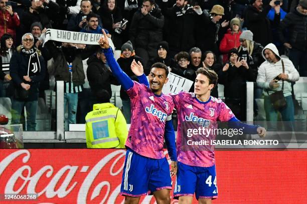 Juventus' Brazilian defender Danilo celebrates with Juventus' Italian midfielder Nicolo Fagioli after opening the scoring during the Italian Serie A...