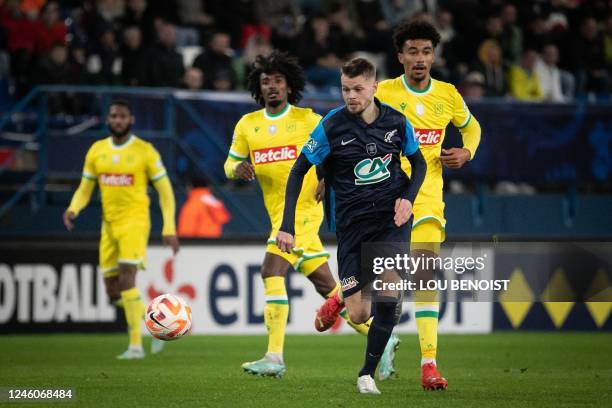 Vire's French forward Arthur Dallois runs with the ball during the French Cup round of 64 football match between AF Virois and FC Nantes at the...
