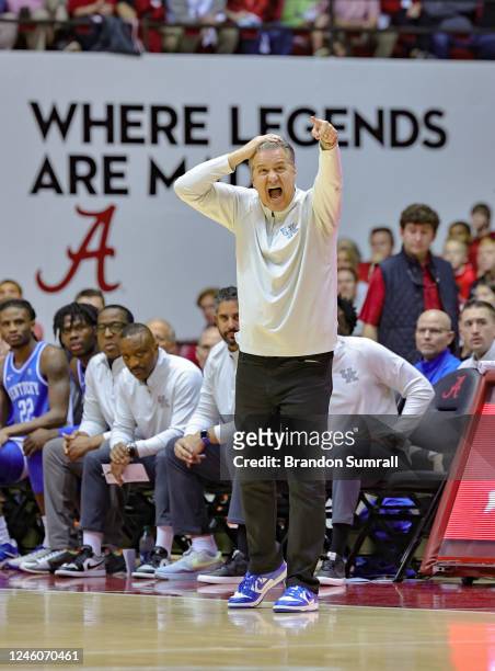 Head coach John Calipari of the Kentucky Wildcats instructs his team during the fist half against the Alabama Crimson Tide at Coleman Coliseum on...